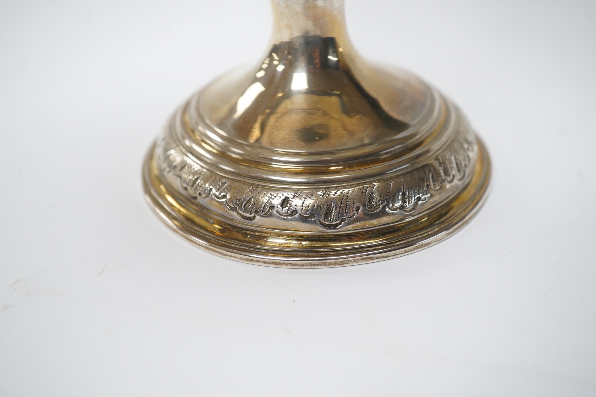 A George II silver goblet, with later embossed decoration and inscription, maker RB London, 1728, 16.6cm, 8.9oz. Condition - fair